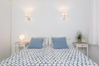 A bed or beds in a room at Apartamento Pinebeach