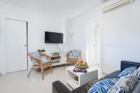 A television and/or entertainment centre at Apartamento Pinebeach