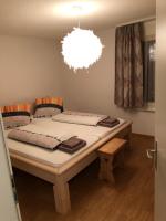 Postel nebo postele na pokoji v ubytování Apartment Laura