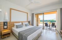 Postel nebo postele na pokoji v ubytování Kiani Beach Resort Family All Inclusive