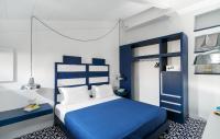 A bed or beds in a room at Maison Il Conservatorio