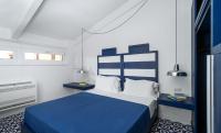 A bed or beds in a room at Maison Il Conservatorio