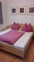 Łóżko lub łóżka w pokoju w obiekcie Ferienwohnung Wohlesser