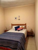 A bed or beds in a room at Valley Views Full House Stargazing in Valencia