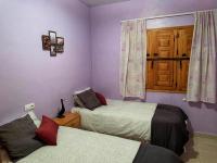A bed or beds in a room at Valley Views Full House Stargazing in Valencia