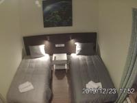 Posteľ alebo postele v izbe v ubytovaní Rent0nline Brwinow Rooms