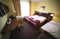 Postel nebo postele na pokoji v ubytování Hotel Racek