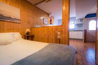 Cama o camas de una habitación en Apartamentos Cudillero