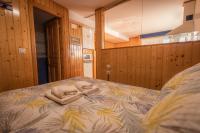 Cama o camas de una habitación en Apartamentos Cudillero