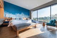 Postel nebo postele na pokoji v ubytování Vann Hua Hin Resort