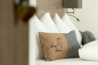 A bed or beds in a room at Haus Garni Luggi Leitner