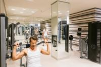 a man exercising in a gym at Royal Hideaway Sancti Petri in Chiclana de la Frontera