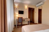 Postel nebo postele na pokoji v ubytování Hotel Leśny