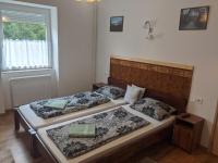 Posteľ alebo postele v izbe v ubytovaní Római Fürdő Apartmanház