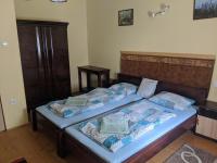 Posteľ alebo postele v izbe v ubytovaní Római Fürdő Apartmanház