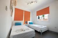 Postel nebo postele na pokoji v ubytování Beach Front Bella Vista by Ezoria Villas