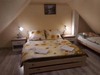 Posteľ alebo postele v izbe v ubytovaní Apartmány Matilda