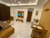 Utsavam Hotel Apartmentsにあるシーティングエリア