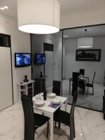 Televízia a/alebo spoločenská miestnosť v ubytovaní La suite del centro storico