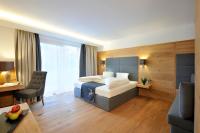 Łóżko lub łóżka w pokoju w obiekcie Sunnsait - Appartements für Genießer