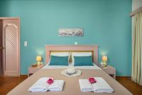 Alkion Hotelにあるベッド