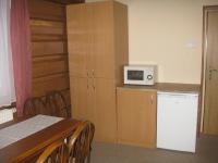 Kuchyň nebo kuchyňský kout v ubytování Apartmány U Vlka