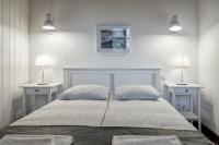 Posteľ alebo postele v izbe v ubytovaní Apartamenty Zdrojowa