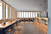 A restaurant or other place to eat at Warth52-W52 Apartments