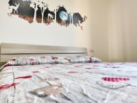 Łóżko lub łóżka w pokoju w obiekcie Appartamento Dolcitalia in Lazise