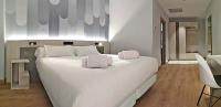 Hotel NERU con Encantoにあるベッド