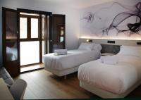 Hotel NERU con Encantoにあるベッド