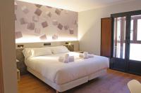 Hotel NERU con Encantoにあるベッド