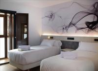 Hotel NERU con Encantoにあるベッド