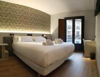 Hotel NERU con Encantoにあるベッド