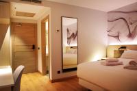 Hotel NERU con Encantoにあるベッド