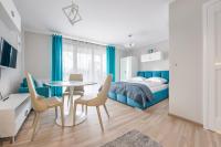 Posteľ alebo postele v izbe v ubytovaní Apartamenty Sun & Snow Rezydencja Park