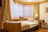 Ein Bett oder Betten in einem Zimmer der Unterkunft Hotel Jägerhof