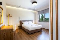 Posteľ alebo postele v izbe v ubytovaní Panorama Luxury Rooms