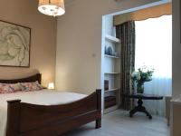 A bed or beds in a room at Alghero Roof Garden