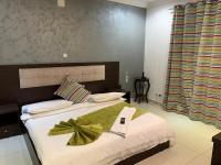 Capital Hôtelにあるベッド