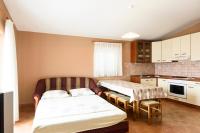 Kuchyň nebo kuchyňský kout v ubytování Apartments Golubić