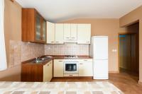 Kuchyň nebo kuchyňský kout v ubytování Apartments Golubić