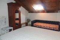 A bed or beds in a room at SENAFER Funtana Meiga