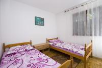 Postel nebo postele na pokoji v ubytování Apartman Laurus Malinska