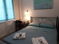 Posteľ alebo postele v izbe v ubytovaní Megaron11 Apartments