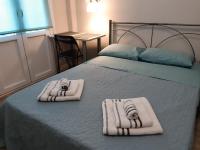 Posteľ alebo postele v izbe v ubytovaní Megaron11 Apartments