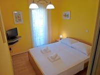 Posteľ alebo postele v izbe v ubytovaní Apartment Honor