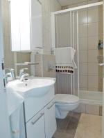 Kúpeľňa v ubytovaní Apartment Honor
