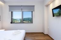 Posteľ alebo postele v izbe v ubytovaní Panorama Luxury Rooms