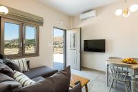 Televízia a/alebo spoločenská miestnosť v ubytovaní Panorama Luxury Rooms